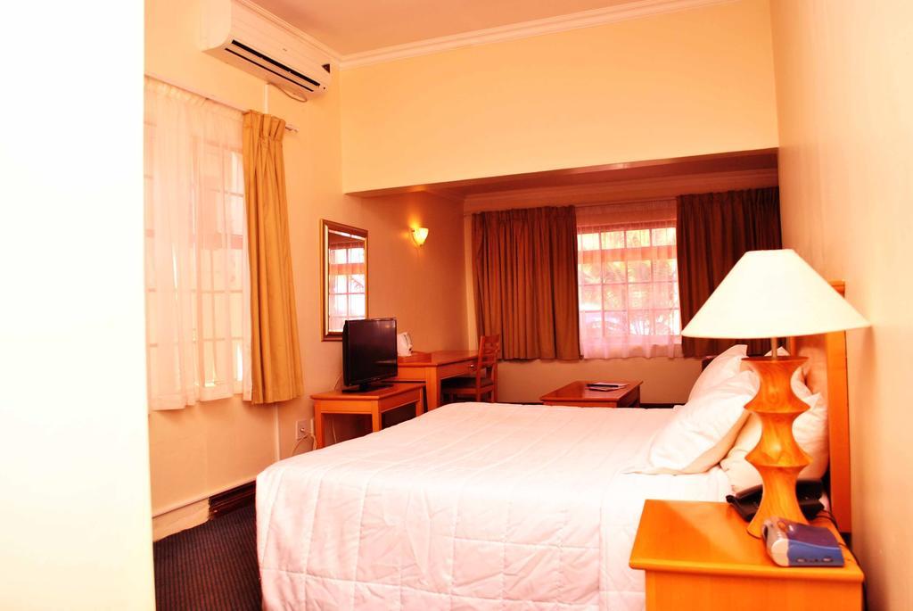 The George Hotel Manzini Værelse billede